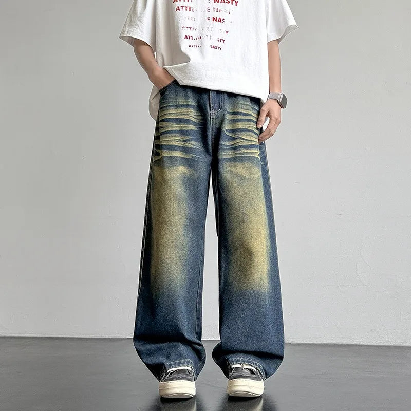 Men's Baggy Jeans in Faded Denim with Exposed Stitching