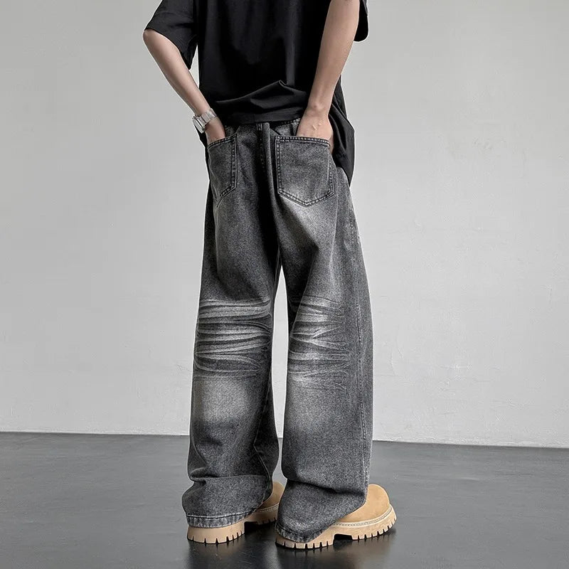 Men's Baggy Jeans in Faded Denim with Exposed Stitching