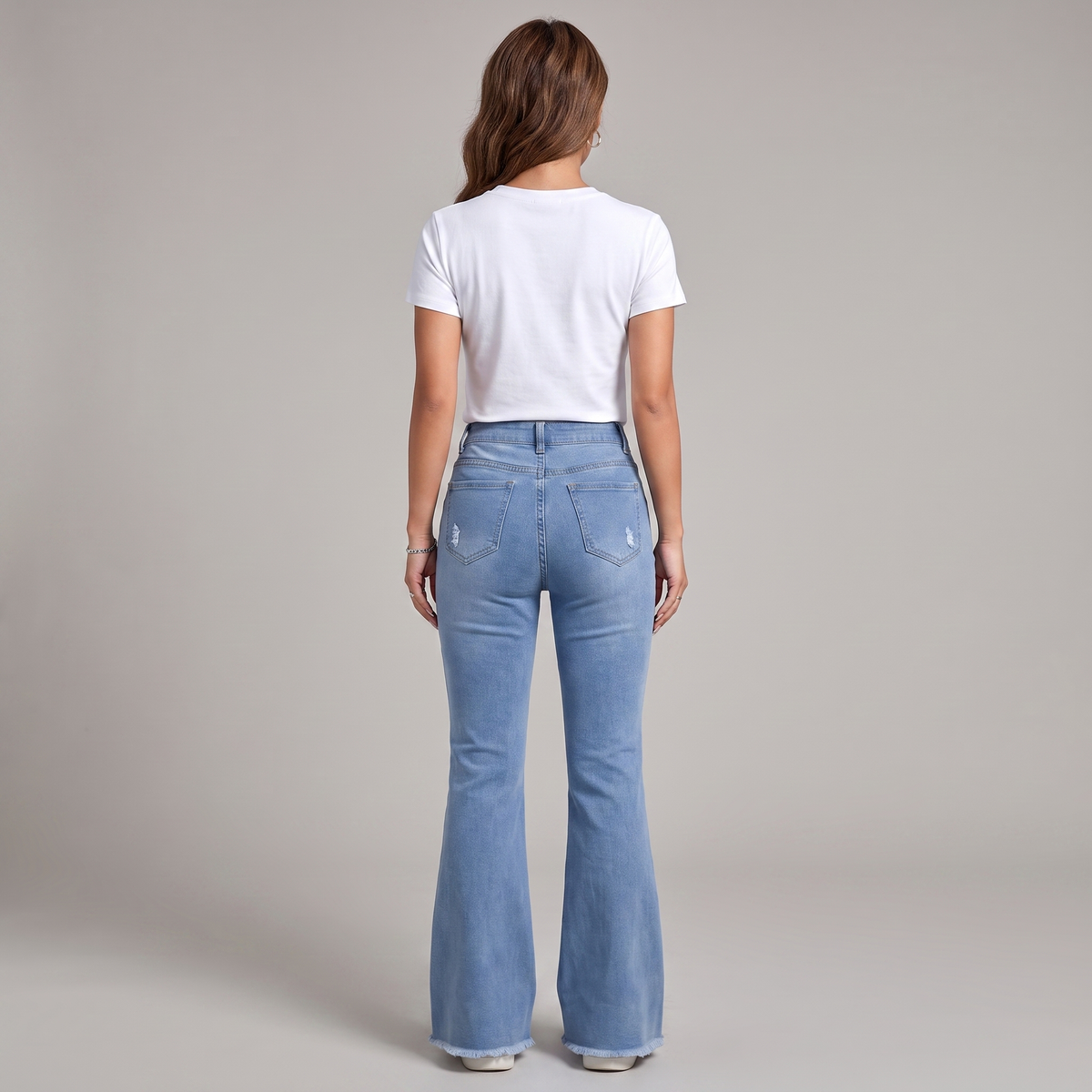 High Waisted Flared Jeans In Light Blue Ripped Denim